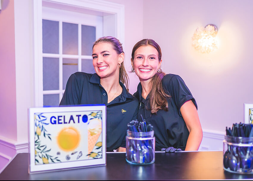 Two staff members at Gelato counter