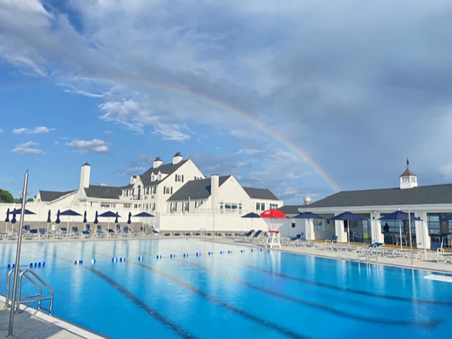 pool with rainbow in the background