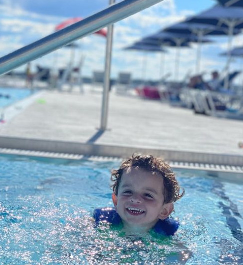 young boy swimming